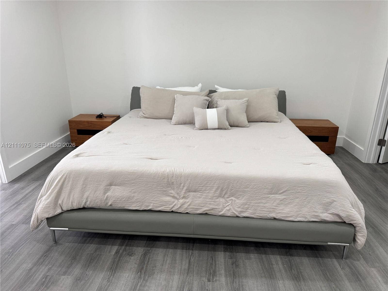 2318 NE 7th Street, #34, Hallandale Beach, Hallandale Beach, FL 33009 Wood-finish flooring throughout with neutral wall tones
