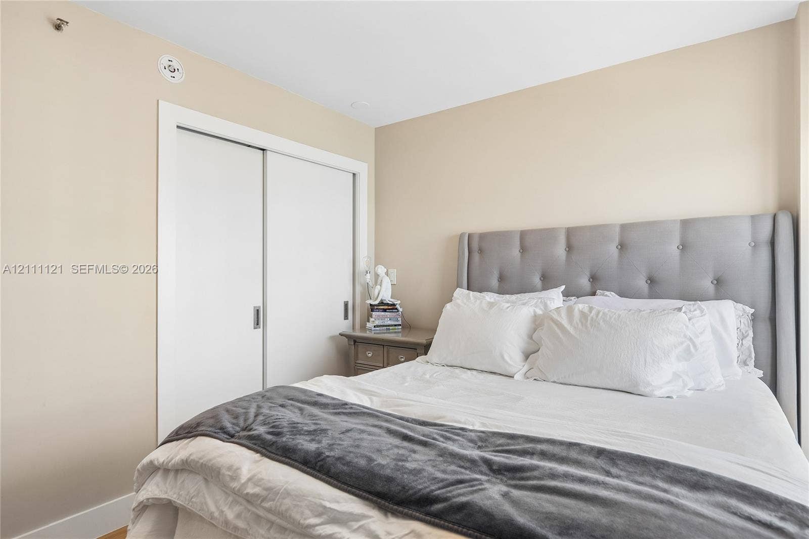 3300 NE 192nd Street, #1813, Aventura, FL 33180 Neutral wall finishes and a built-in closet with sliding doors