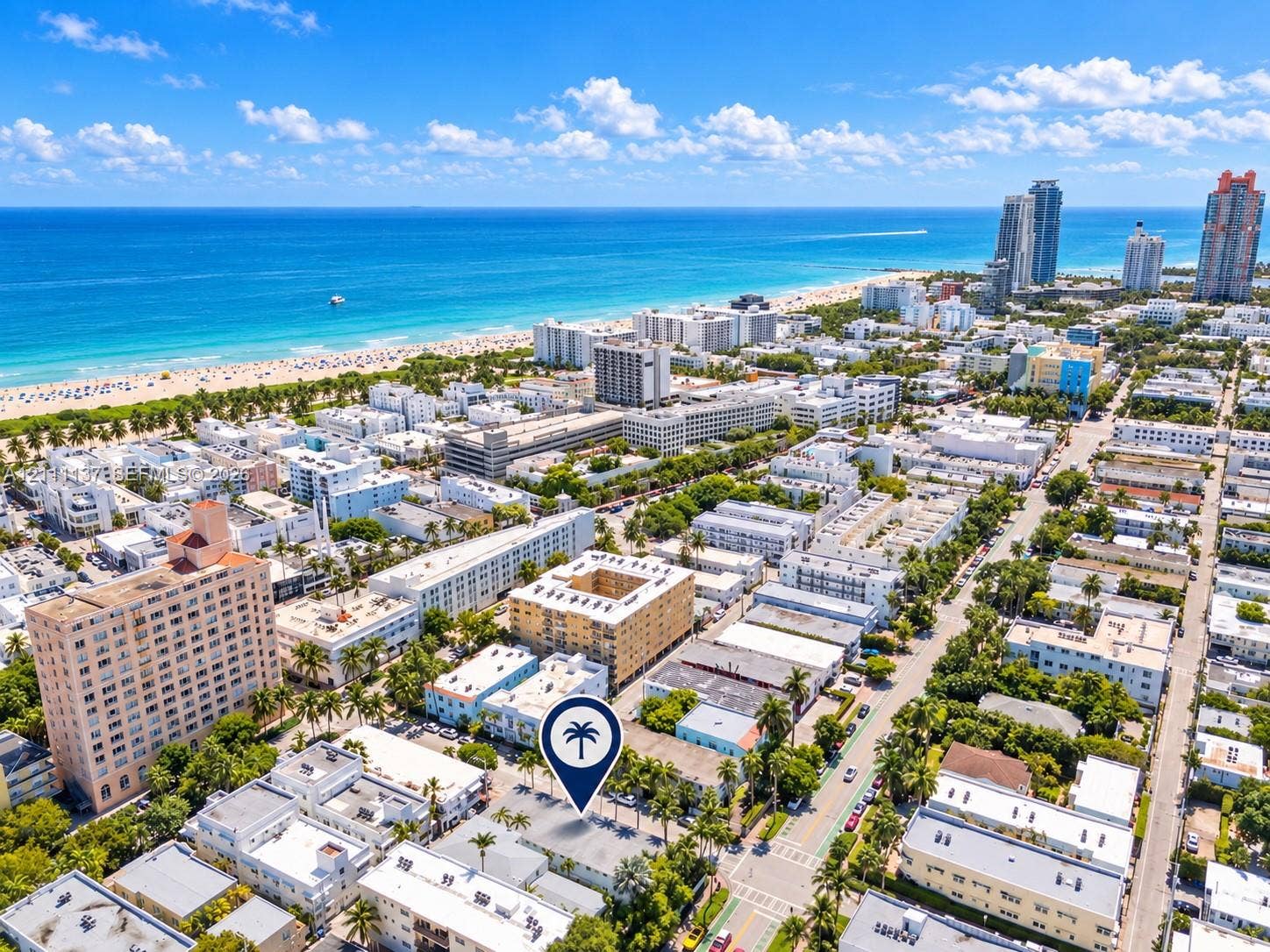 635 8th Street, #205, Miami Beach, Miami Beach, FL 33139 Aerial perspective featuring close proximity to the coastline, expansive ocean scenery, and a dense urban grid