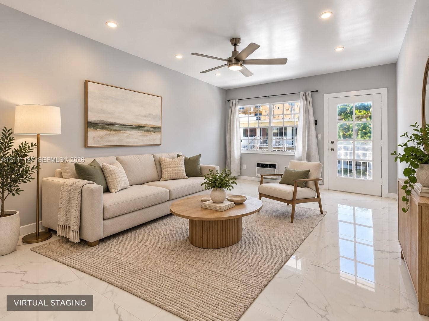 635 8th Street, #205, Miami Beach, Miami Beach, FL 33139 Neutral-toned interior featuring polished stone-finish flooring, recessed lighting, a brushed-nickel ceiling fan, and a glass-paneled exterior door