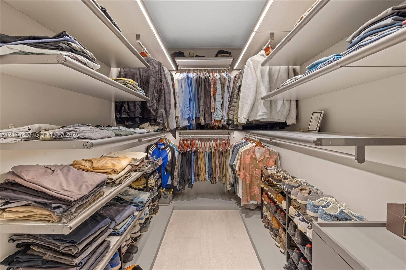 Den converted into custom walk-in closet for primary