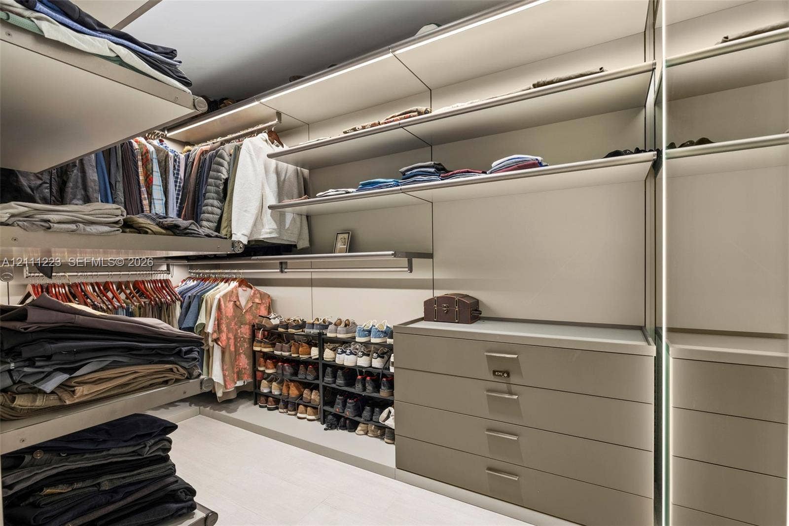 Den converted into custom walk-in closet for primary