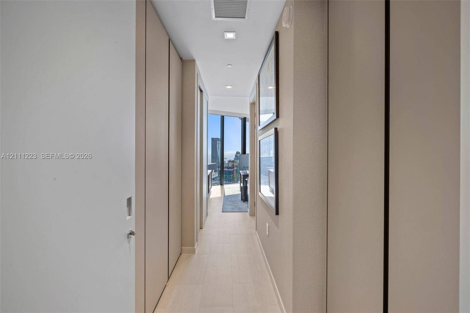 Entrance to 3rd bedroom - closets left & right side