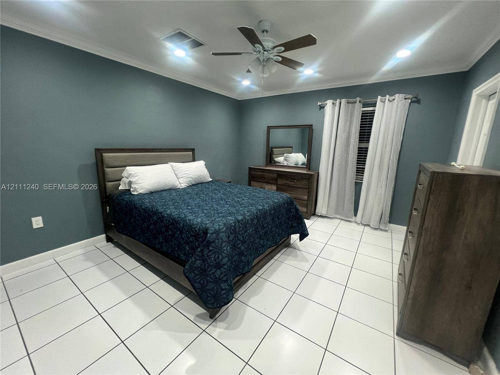 1430 Polk Street, Hollywood, Hollywood, FL 33020 Room featuring large-format tile flooring, crown molding, recessed lighting, and a ceiling fan