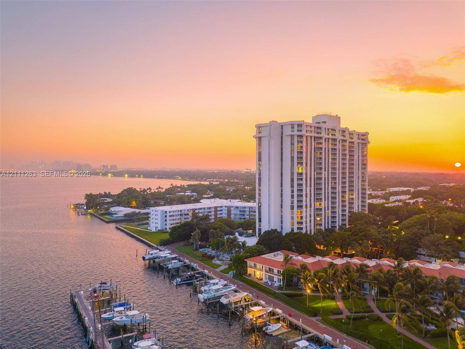 4000 Towerside Terrace, #604, Miami, FL 33138 Waterfront high-rise building featuring private boat slips, extensive landscaped grounds, and paved walking paths