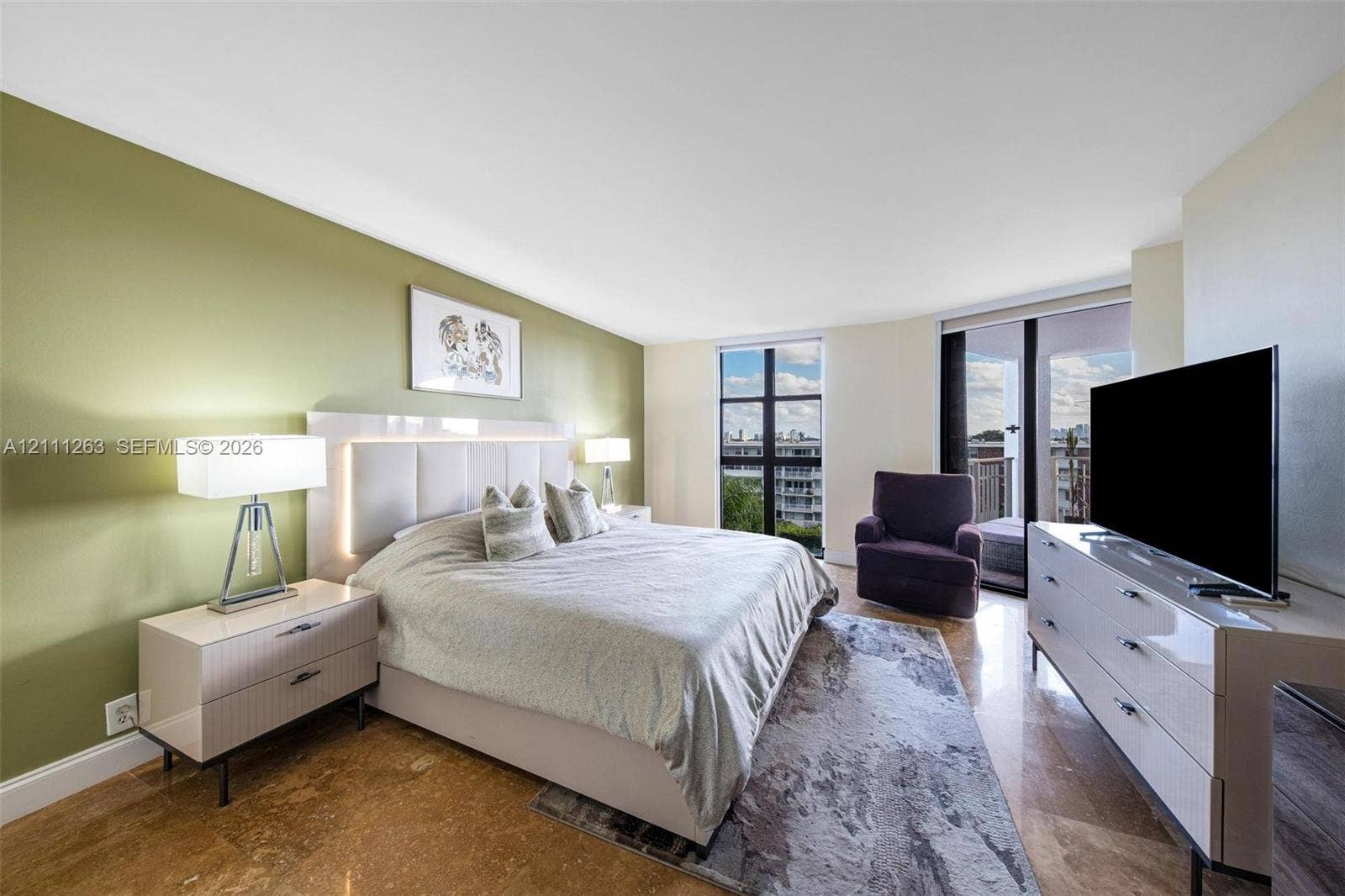 4000 Towerside Terrace, #604, Miami, FL 33138 Bedroom featuring polished stone flooring, floor-to-ceiling windows, and access to an exterior balcony