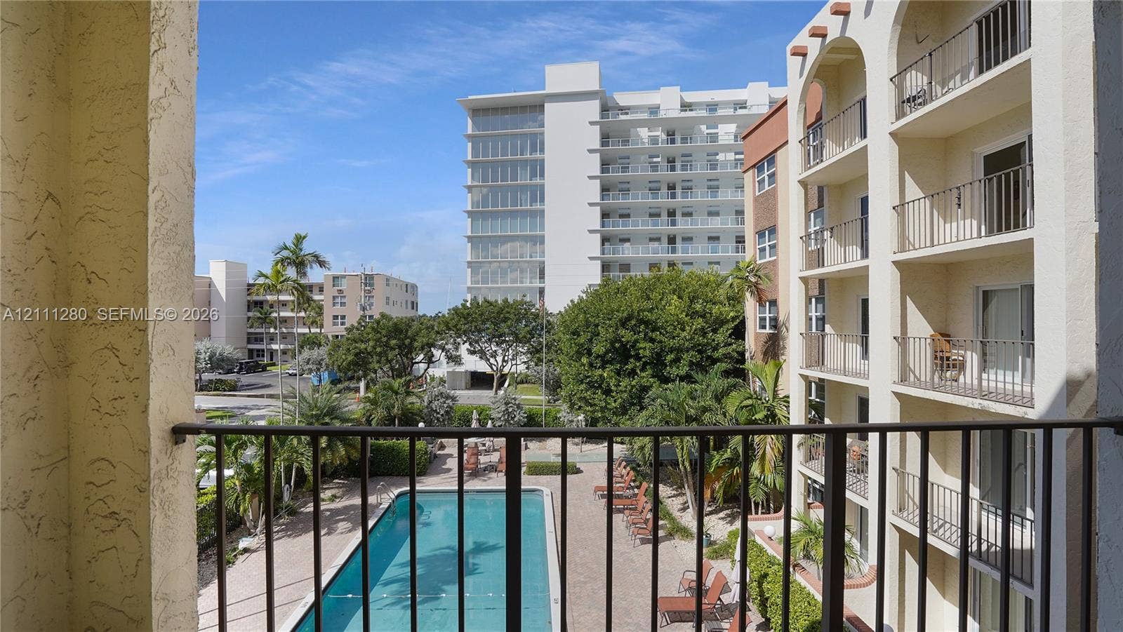 400 N Riverside Drive, #305, Pompano Beach, FL 33062 Beautiful pool area view from your spacious open balcony