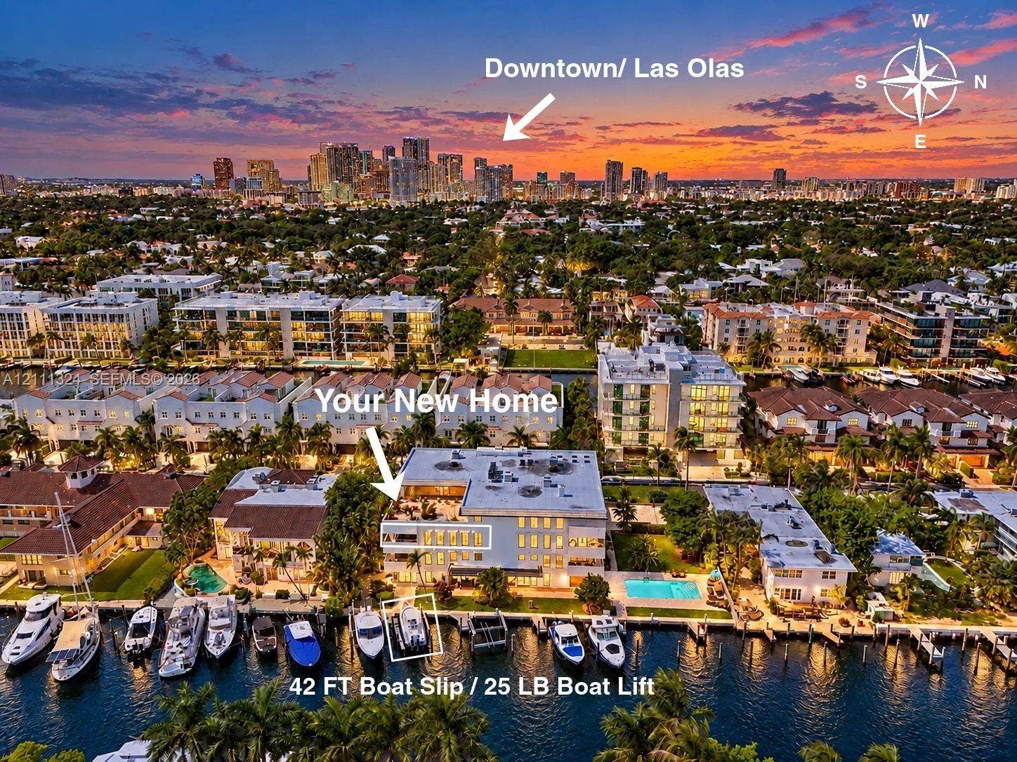 Waterfront estate featuring a 42-foot boat slip, private boat lift, and an expansive outdoor swimming pool