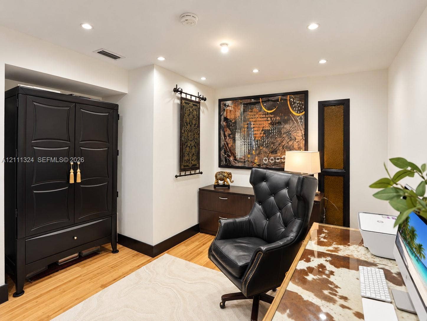 Recessed lighting and wood-finish flooring
