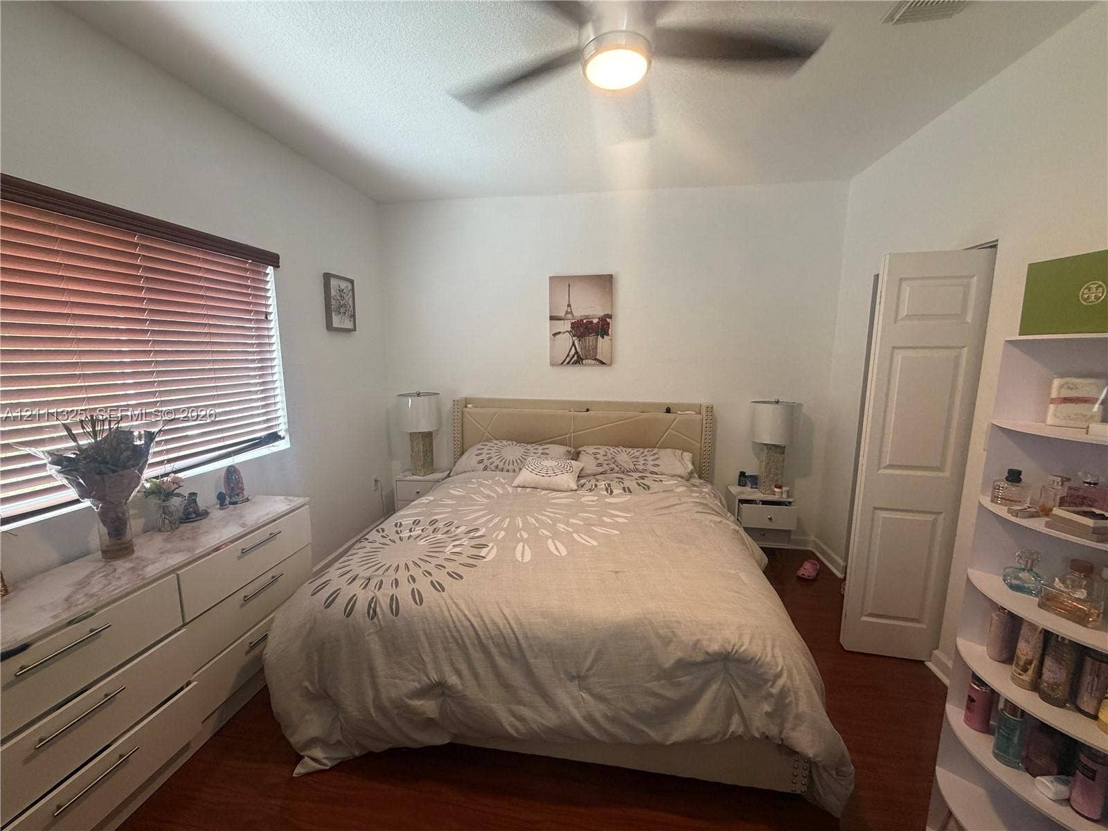 18172 SW 108th Path, Miami, Miami, FL 33157 Interior space featuring wood-finish flooring, a ceiling-mounted light fixture with integrated fan, and horizontal window blinds