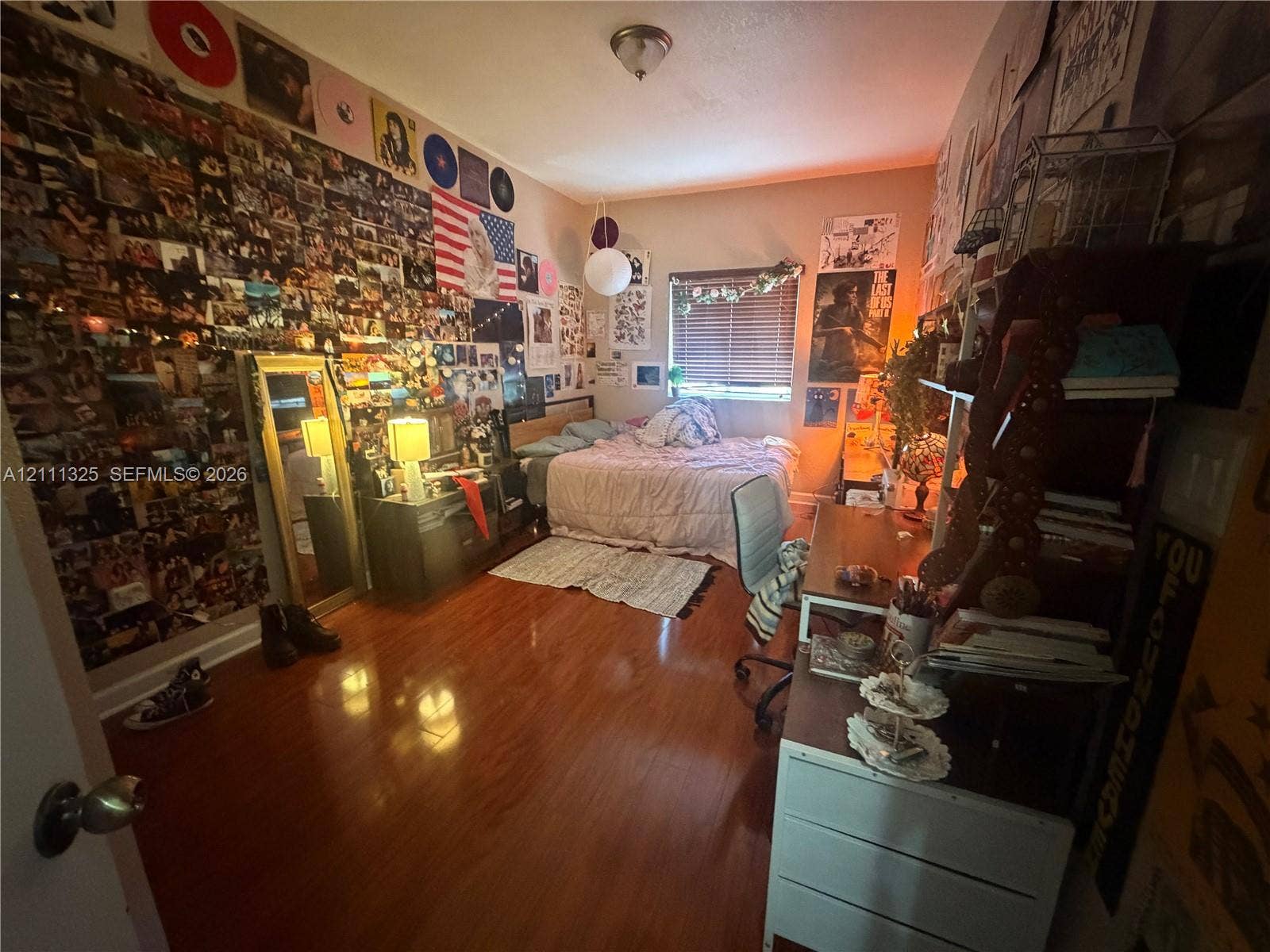 18172 SW 108th Path, Miami, Miami, FL 33157 Room featuring wood-finish flooring, a flush-mount ceiling light, and a window with horizontal blinds