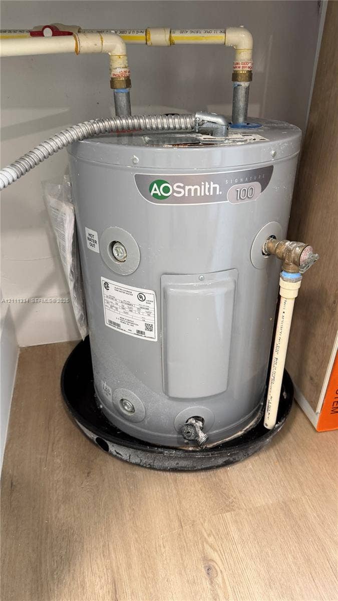3314 NW 8th, #1, Miami, Miami, FL 33131 AO Smith Signature 100 water heater with a drain pan, installed with flexible conduit and CPVC piping