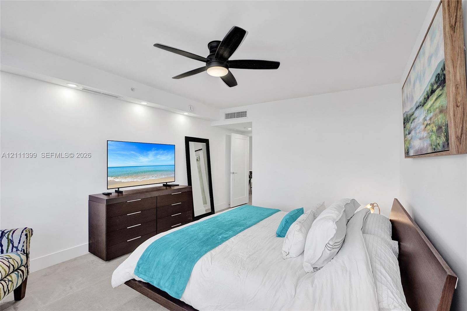2501 S Ocean Drive, #1630, Hollywood, Hollywood, FL 33019 Recessed ceiling lighting, matte black five-blade ceiling fan, and large-format neutral tile flooring