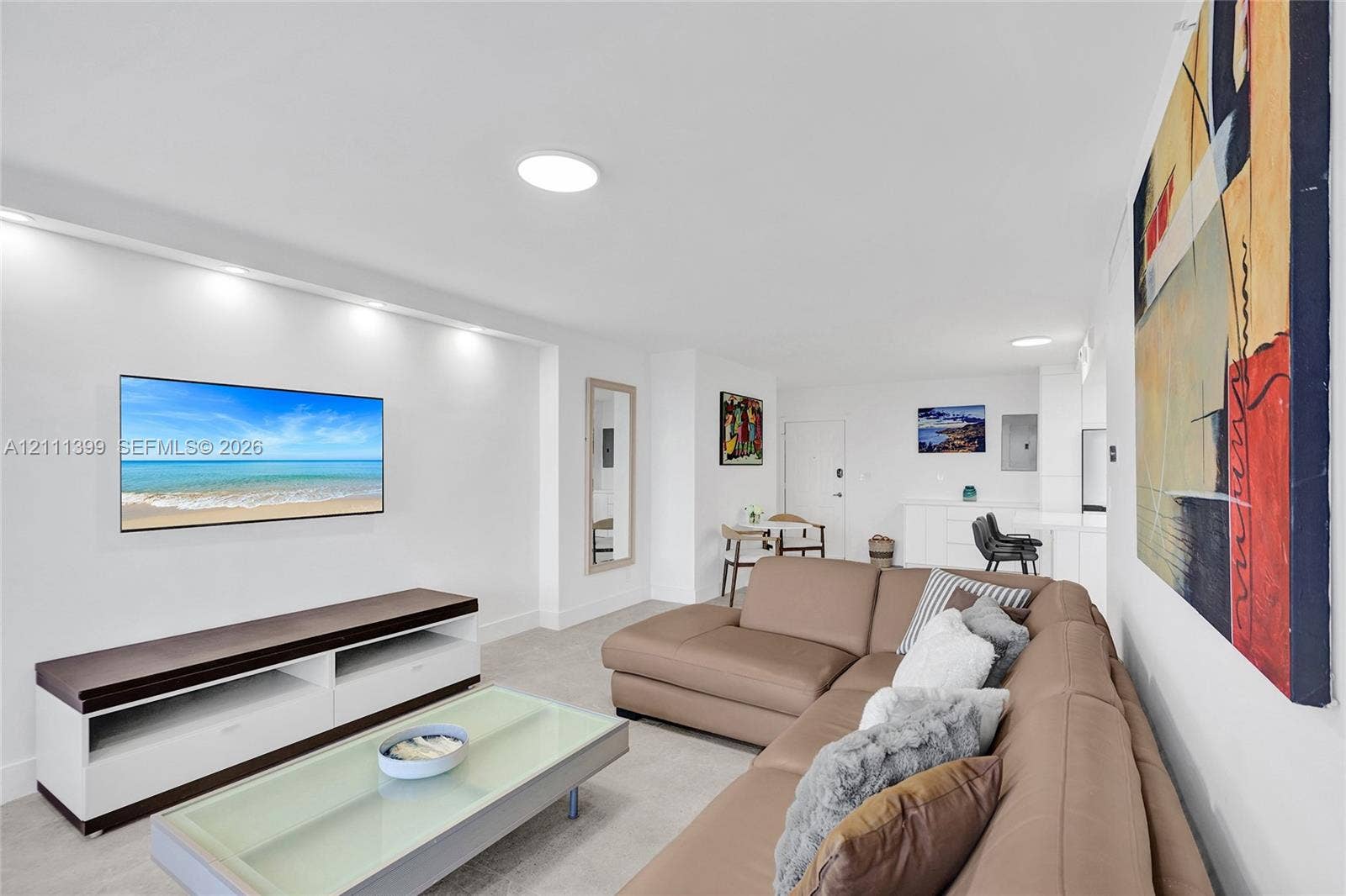 2501 S Ocean Drive, #1630, Hollywood, Hollywood, FL 33019 Living area featuring recessed wall shelving with integrated lighting and flush-mount ceiling lighting