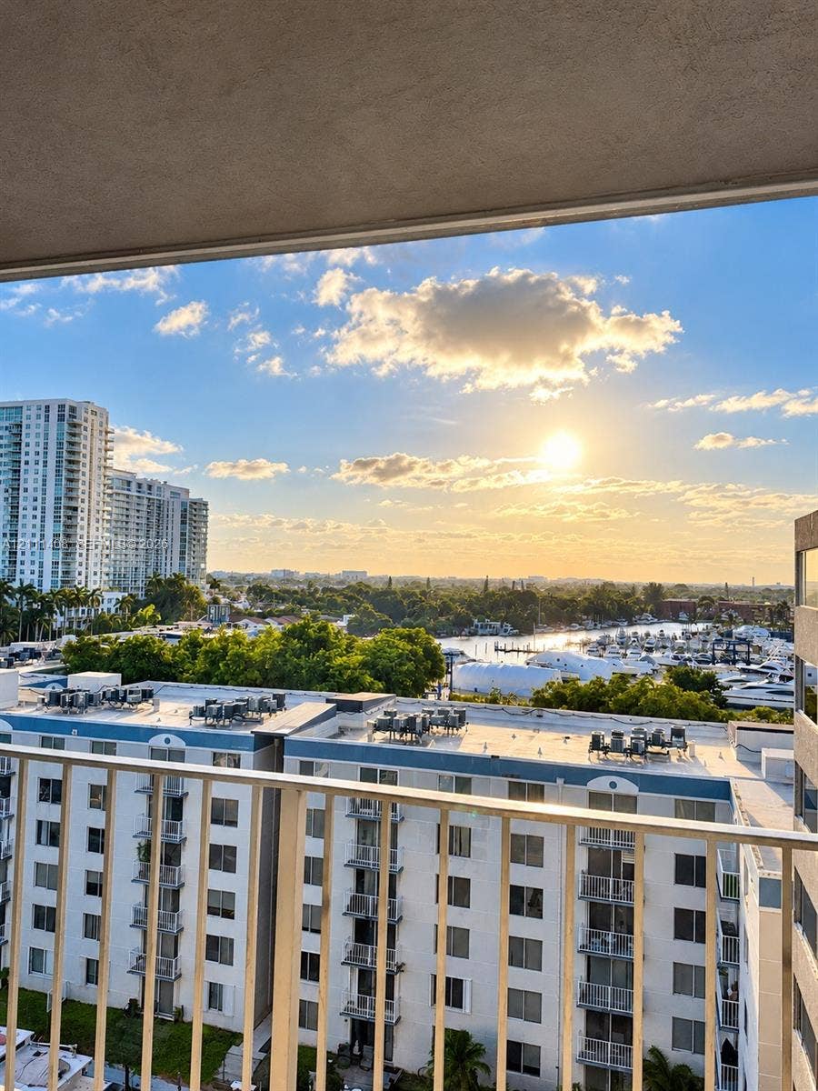 1700 N River Drive, #1004, Miami, FL 33125 Marina frontage featuring multiple boat slips and a sprawling harbor landscape