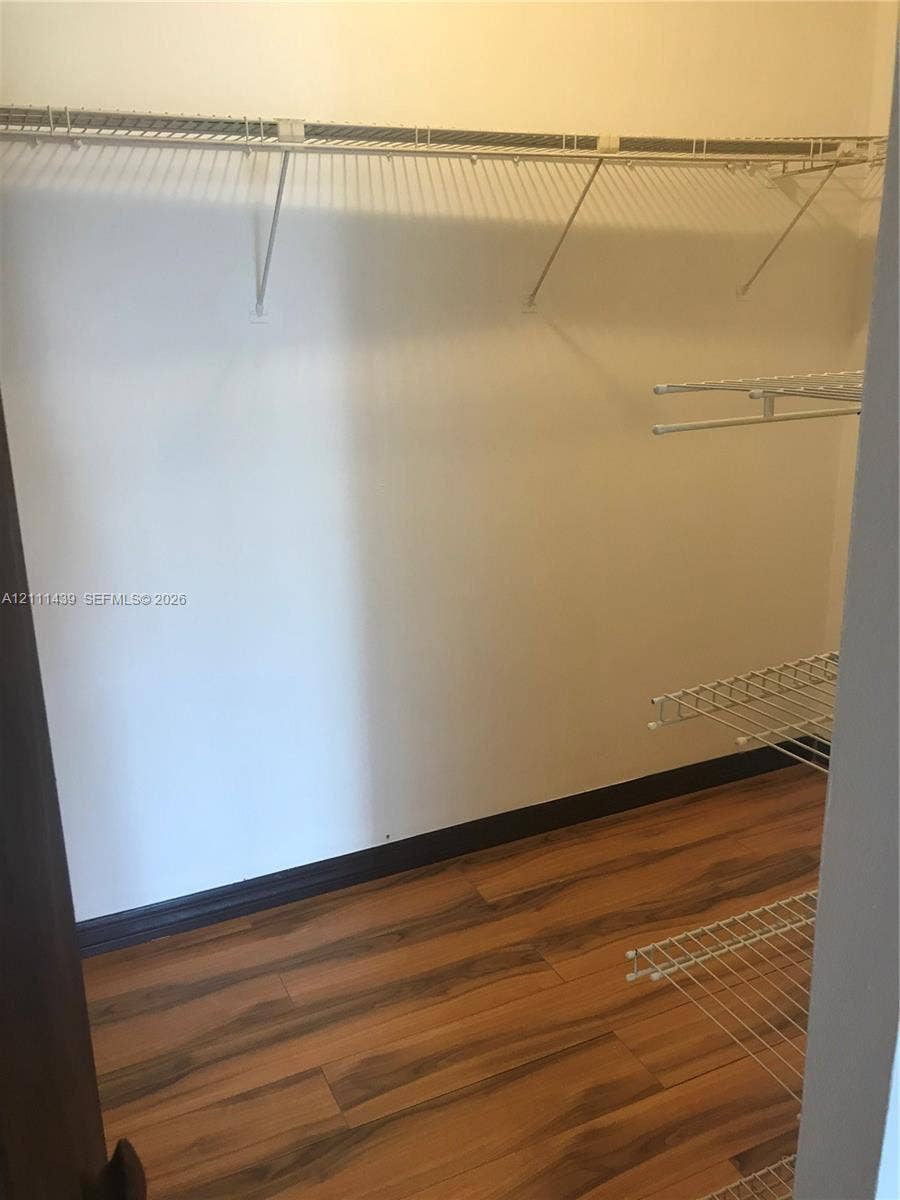 800 Parkview Drive, #102, Hallandale Beach, Hallandale Beach, FL 33009 Storage space featuring wood-finish flooring and multi-level wire shelving
