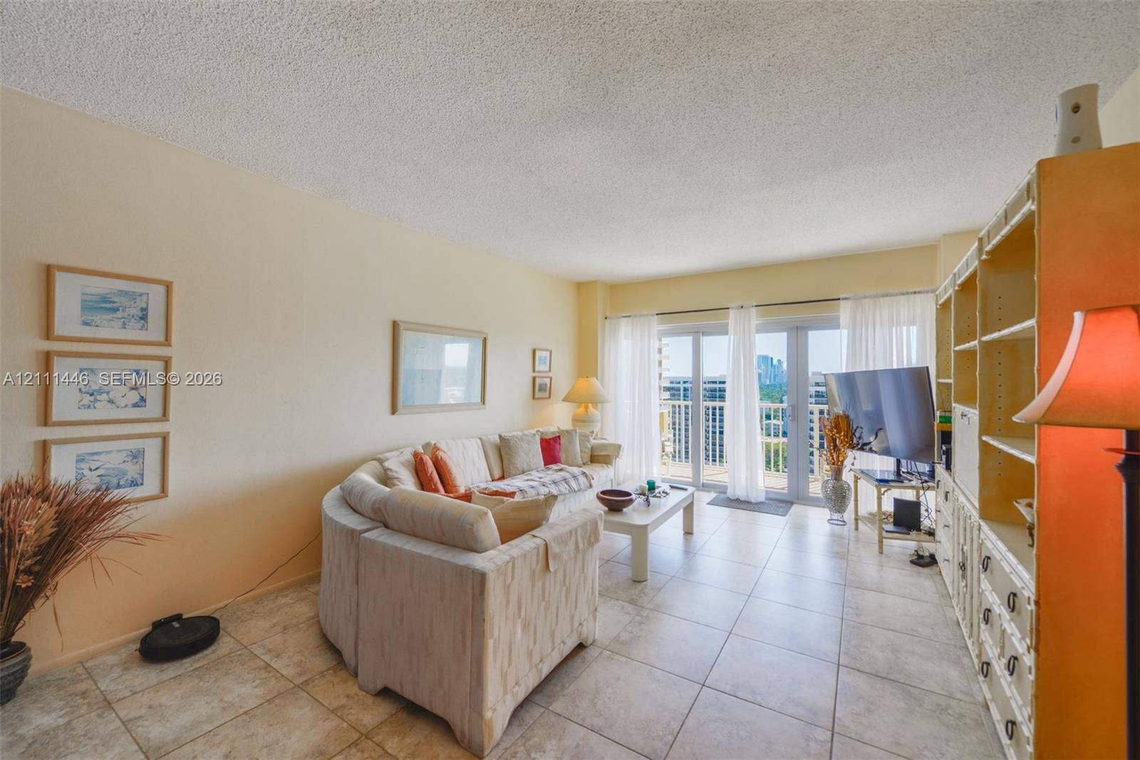 1965 S Ocean Drive, #15M, Hallandale Beach, Hallandale Beach, FL 33009 Large format floor tiling, expansive glass sliding doors, and built-in floor-to-ceiling cabinetry
