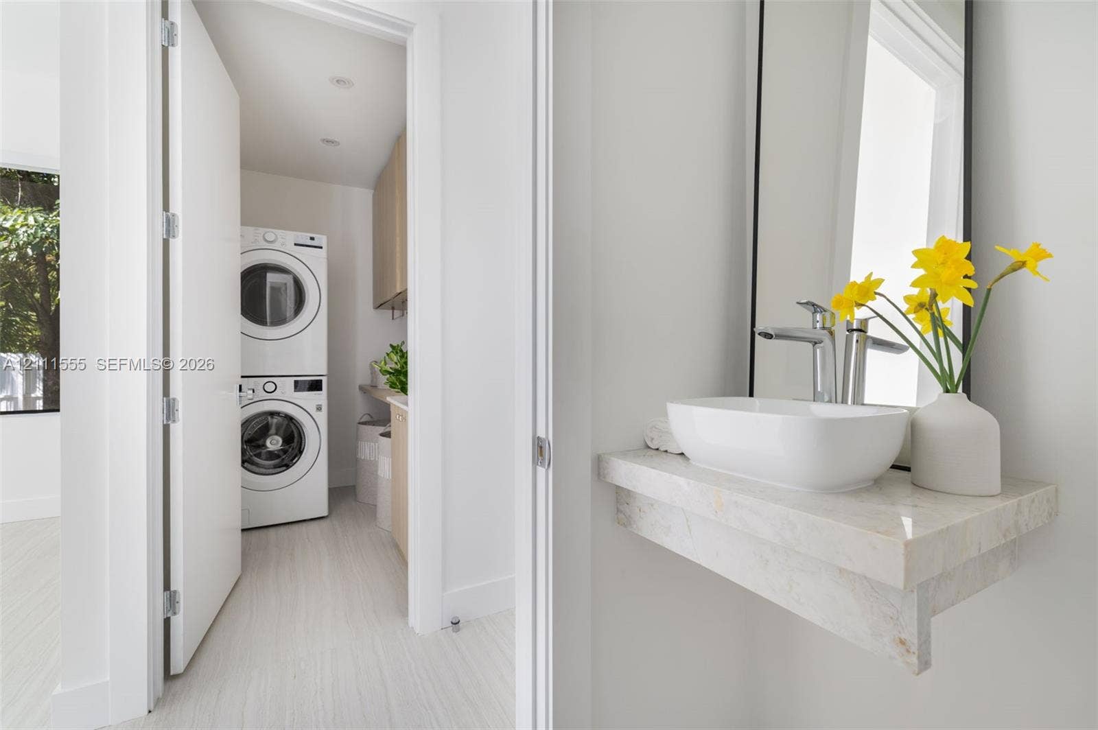 8800 SW 118th Street, Miami, Miami, FL 33176 Floating stone vanity with vessel sink and metal faucet, paired with a laundry area featuring a stacked washer and dryer set and custom cabinetry