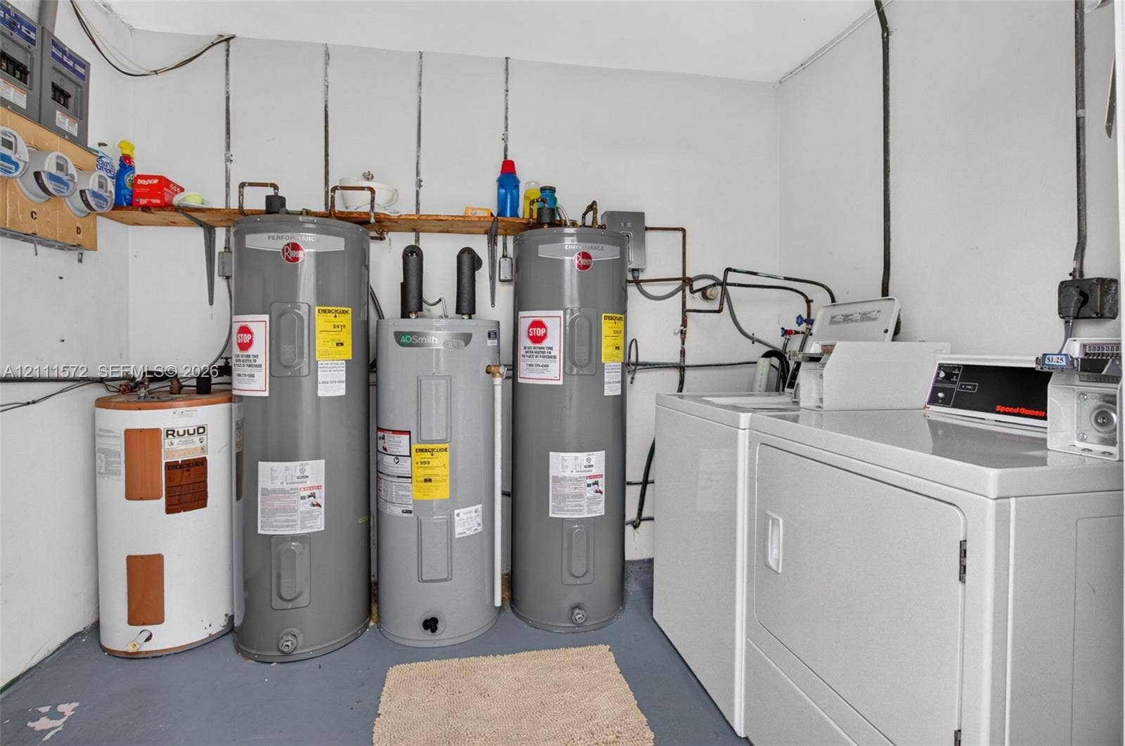 Laundry room shared by 4 units if you don't install your own W/D. Bonus that your water heater won't flood your unit!