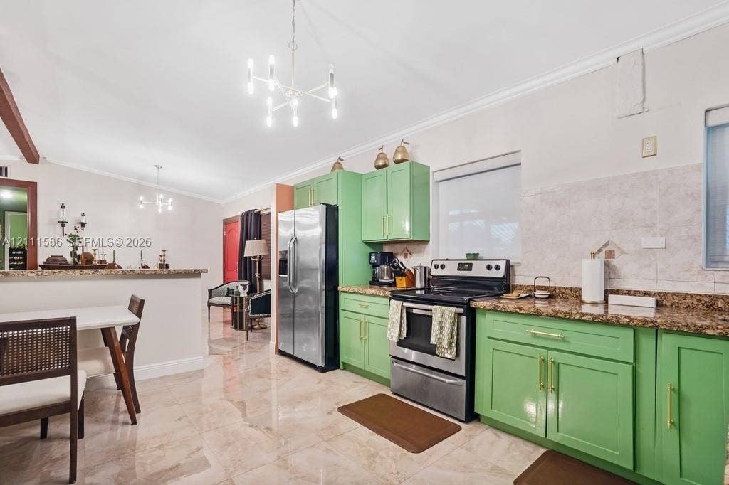 20431 NE 14th Court, Miami, FL 33179 Kitchen featuring green cabinetry, stone-finish countertops, tile backsplash, polished stone-finish flooring, and modern multi-arm chandelier lighting