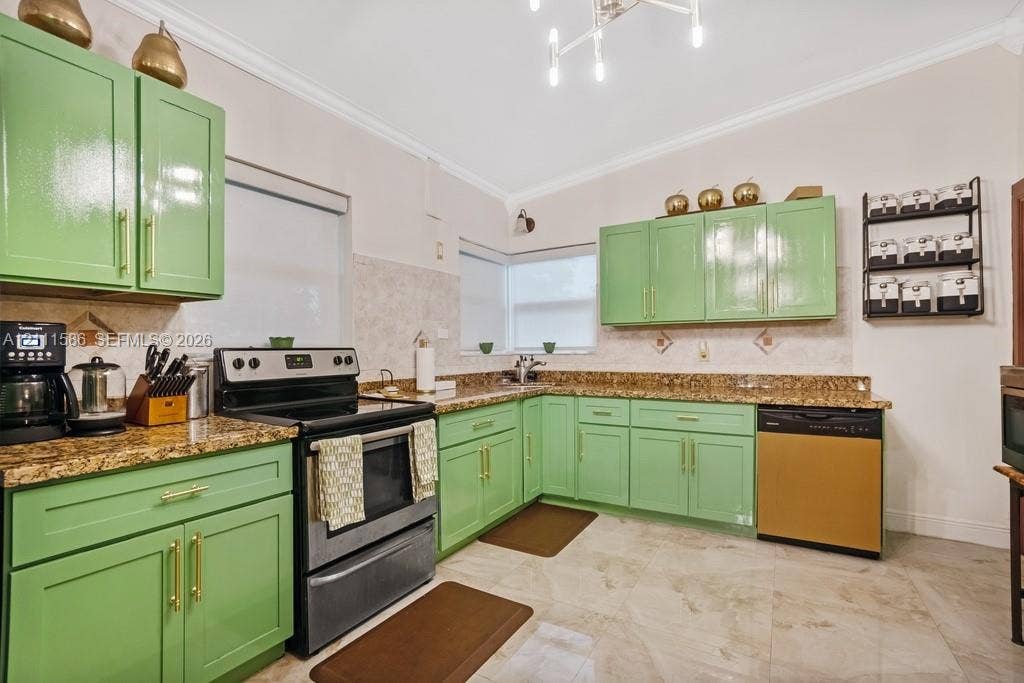 20431 NE 14th Court, Miami, FL 33179 Kitchen featuring glossy green cabinetry with gold-tone hardware, stone-surface countertops, tile backsplash, and large-format tile flooring