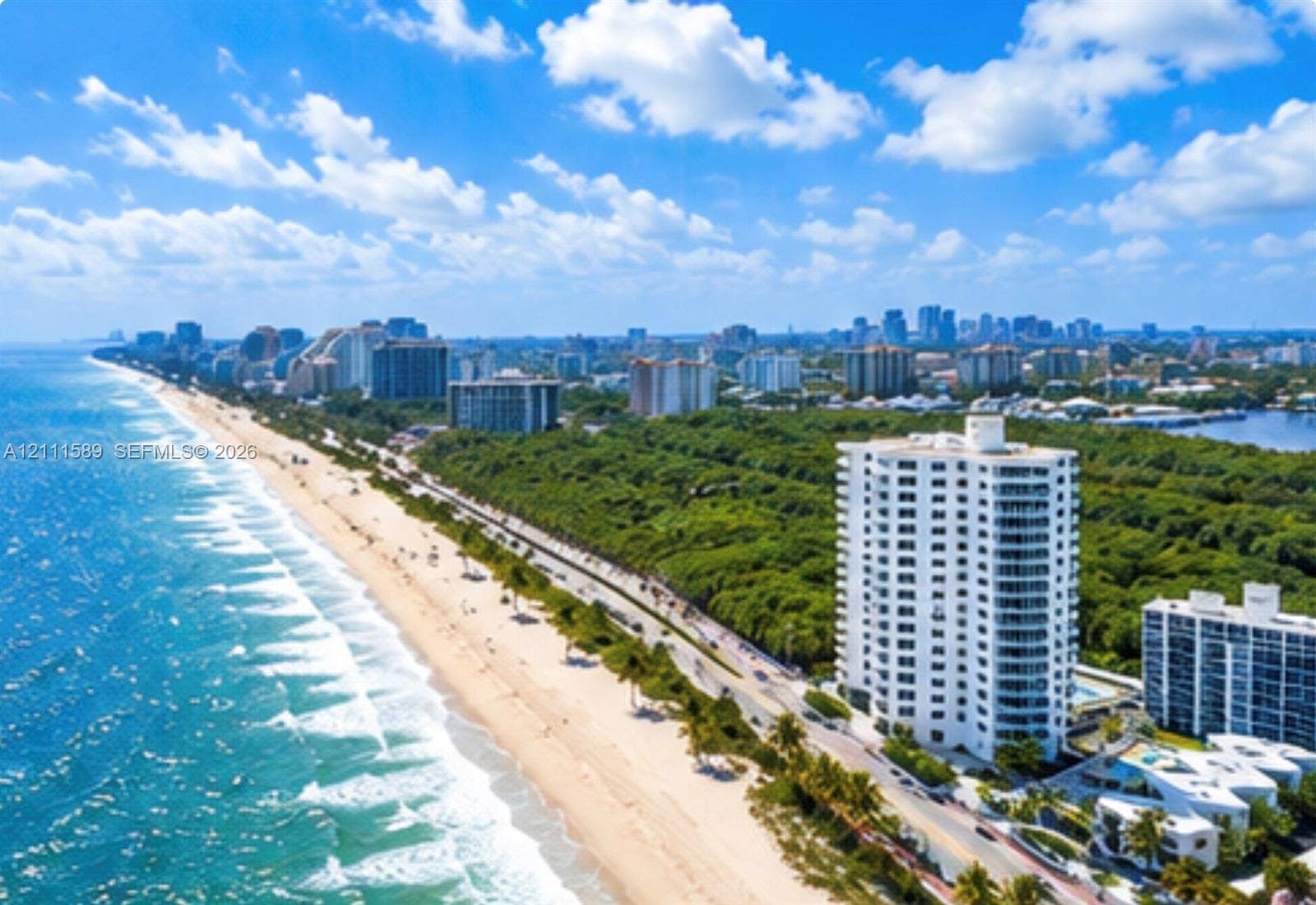 Coastal high-rise residence featuring direct proximity to the shoreline, wrap-around balconies, and an outdoor swimming pool facility