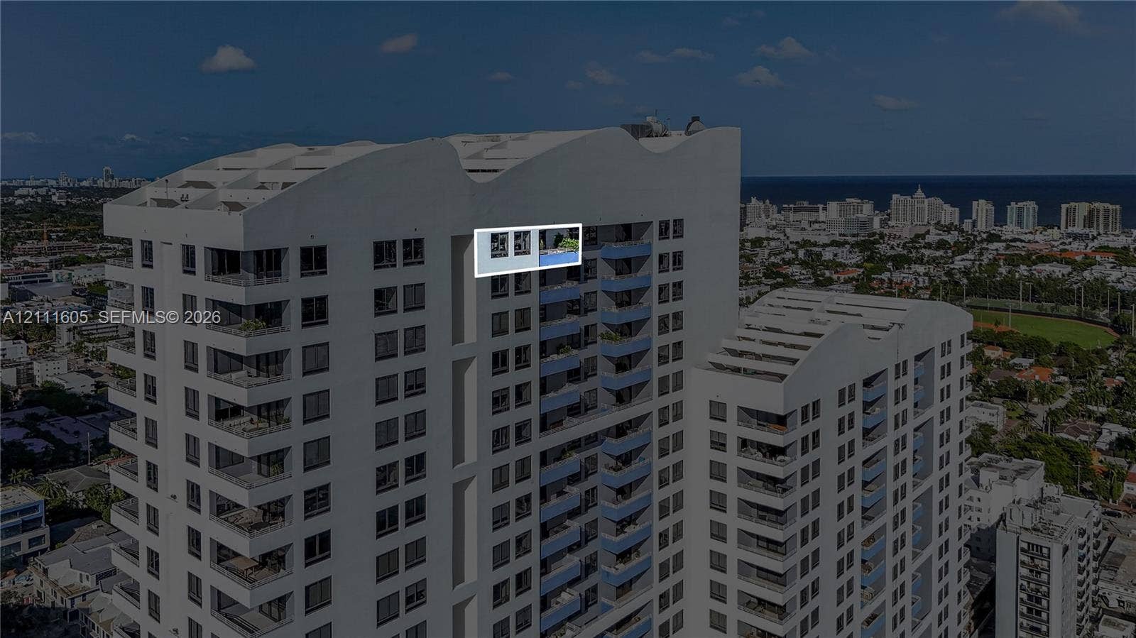 High-rise residential exterior featuring a private cantilevered balcony with a built-in plunge pool