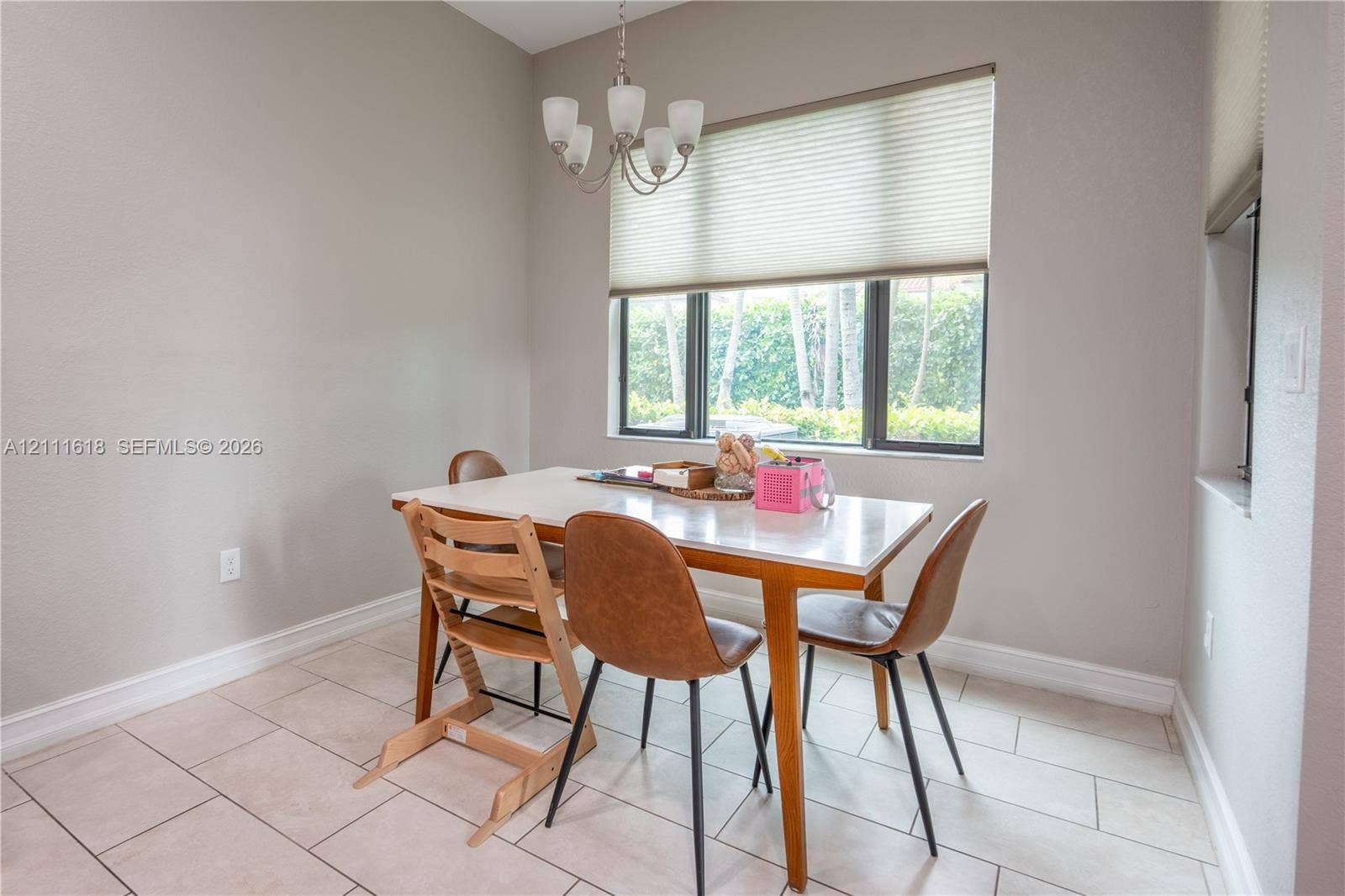 1423 SW 115th Avenue, #NA, Pembroke Pines, Pembroke Pines, FL 33025 Multi-light chandelier, neutral ceramic tile flooring, and large window with integrated blinds