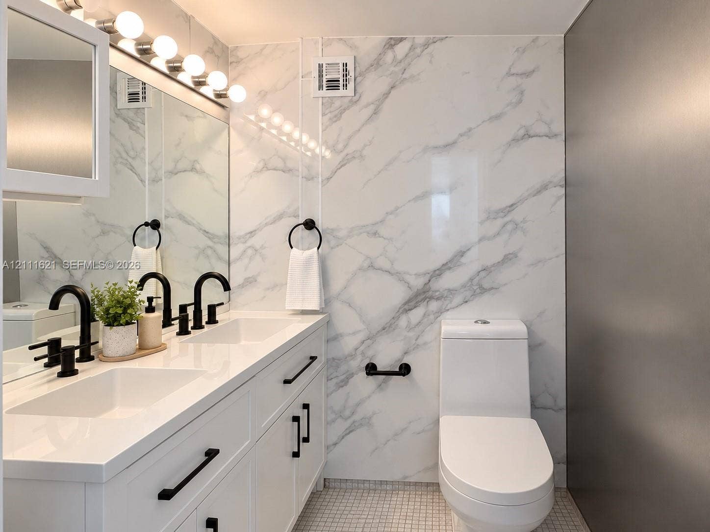 1200 West Avenue, #PH15, Miami Beach, FL 33139 guest half bathroom