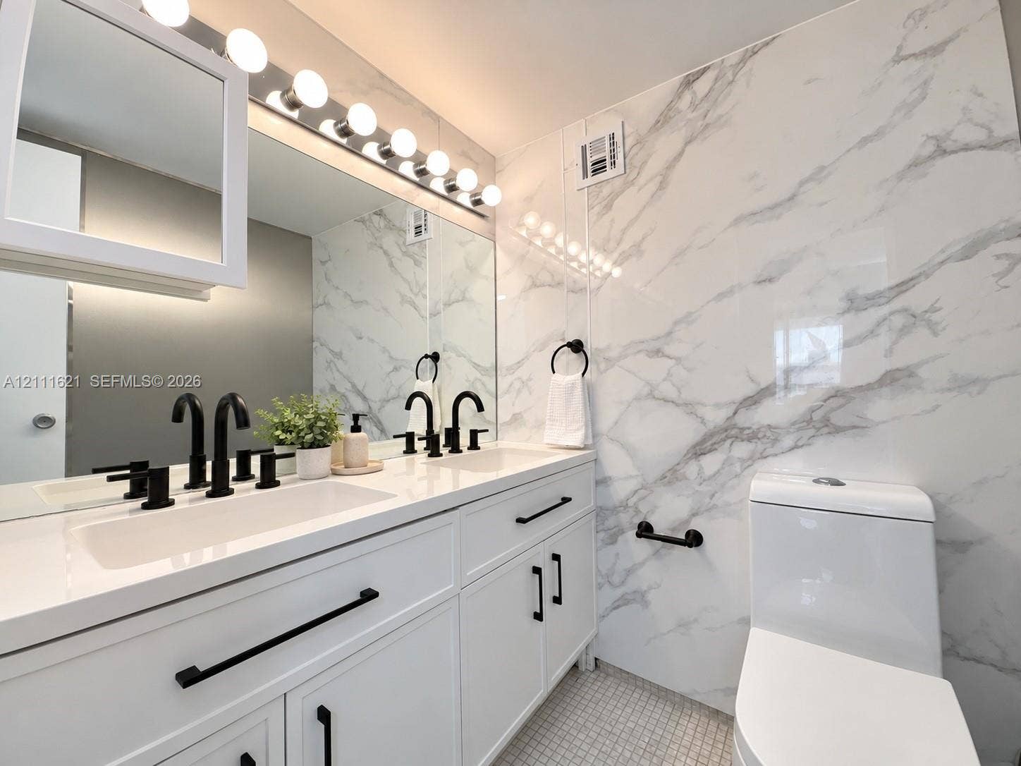 1200 West Avenue, #PH15, Miami Beach, FL 33139 guest half bathroom