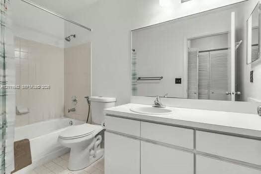 12801 SW 248th Terrace, Homestead, FL 33032 Bathroom featuring a white vanity cabinet, solid-surface countertop with an integrated basin, expansive wall-mounted mirror, and a tile-surround tub-shower combination
