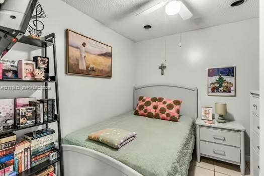 12801 SW 248th Terrace, Homestead, FL 33032 Neutral-toned interior room featuring tile flooring, recessed lighting, and a ceiling fan with integrated light fixture