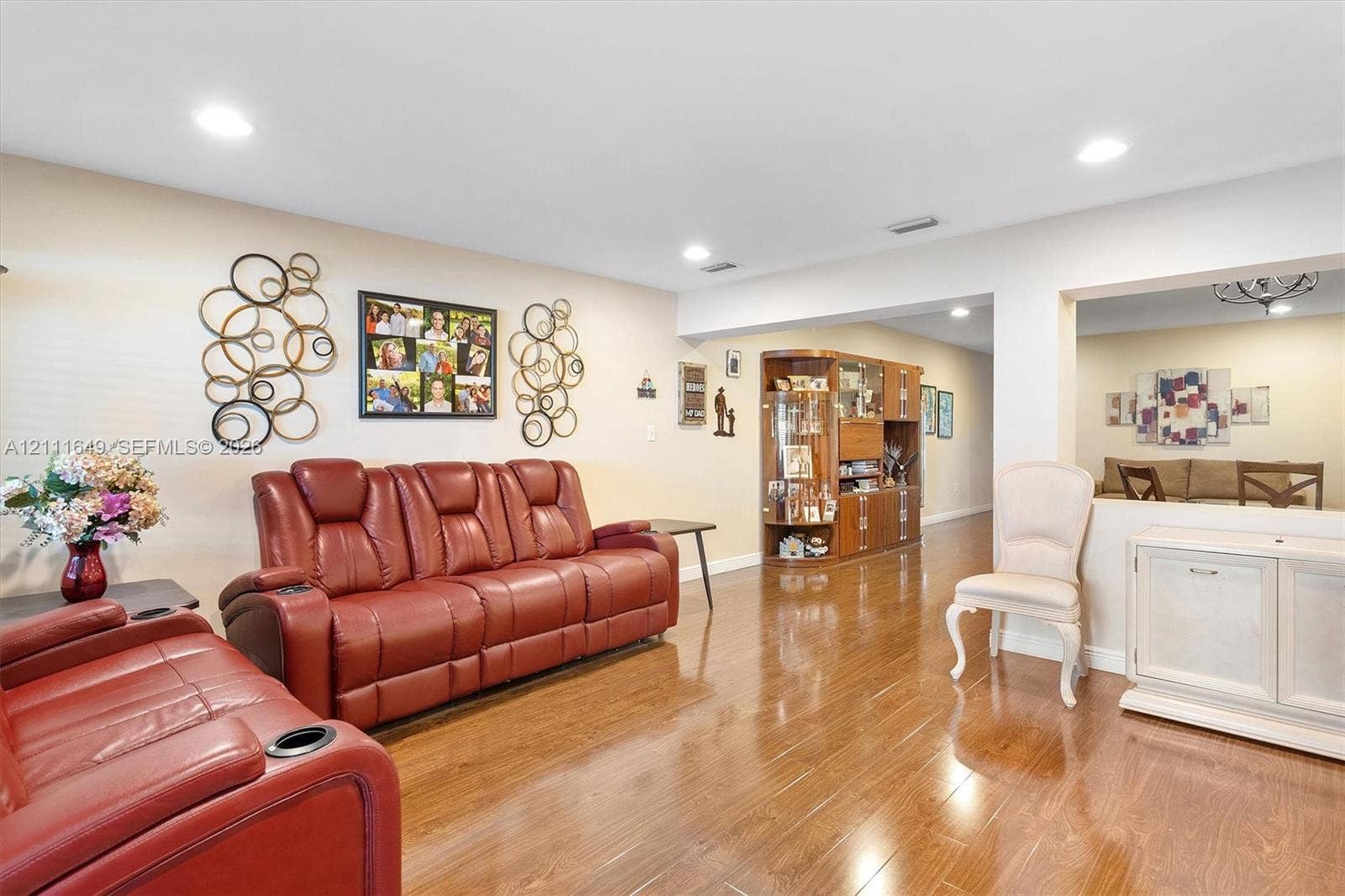Interior featuring wood-finish flooring, recessed lighting, and built-in cabinetry
