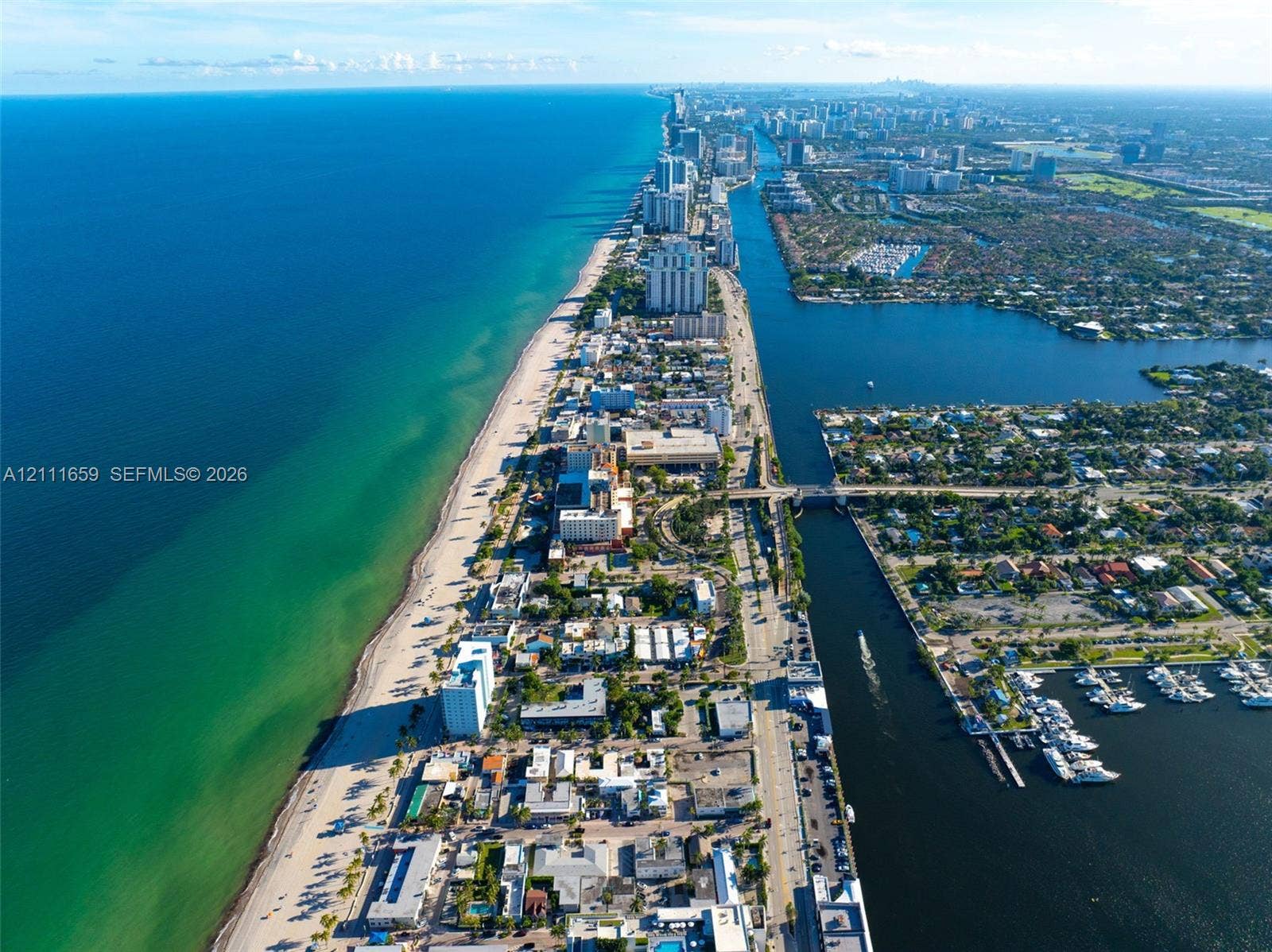 338 Taylor Street, #2, Hollywood, Hollywood, FL 33019 Aerial perspective of the coastline featuring expansive ocean frontage, sandy beaches, inland waterway access, and harbor docking facilities