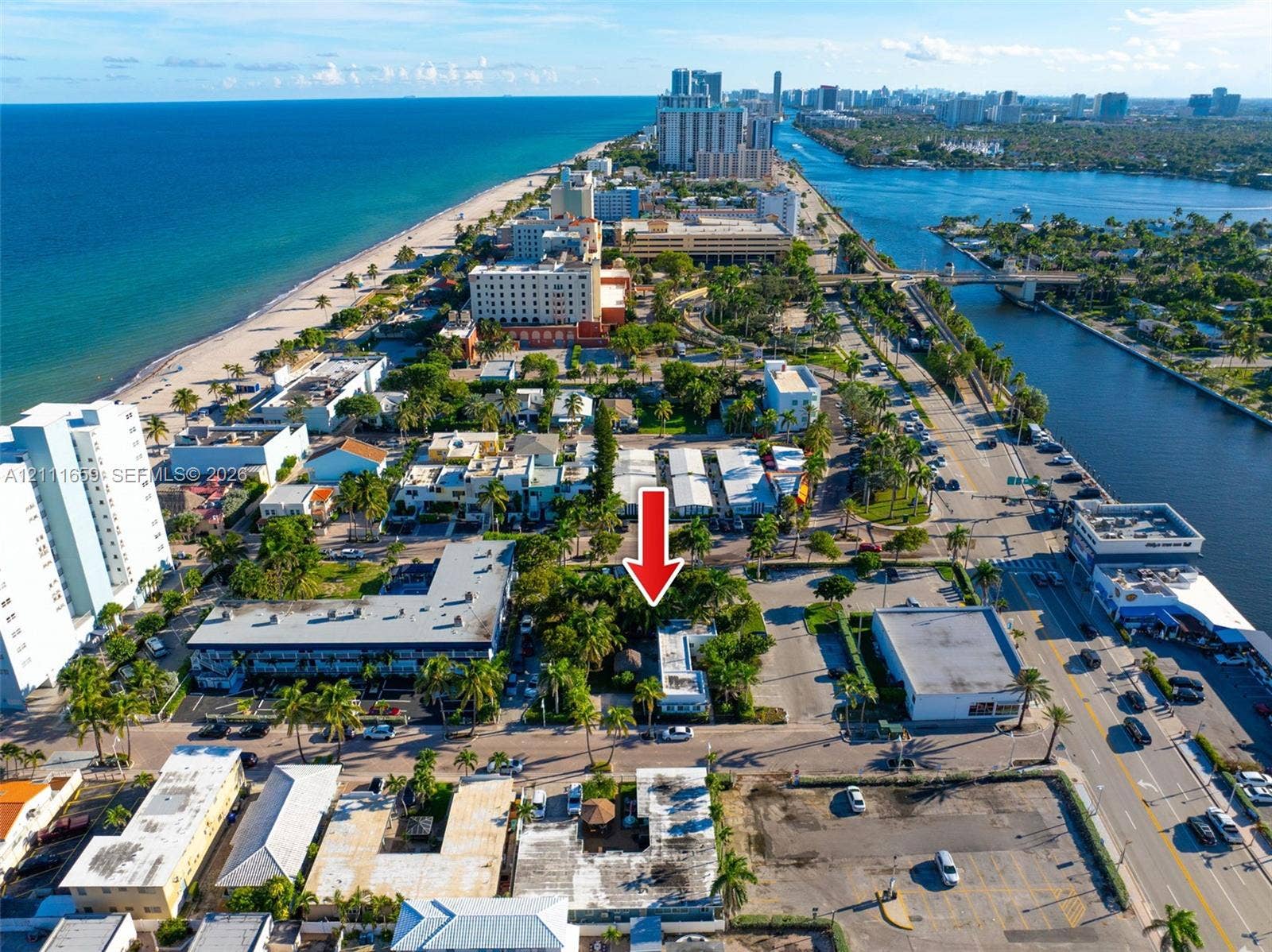 338 Taylor Street, #2, Hollywood, Hollywood, FL 33019 Aerial perspective showcasing a coastal parcel situated between the Atlantic Ocean and the Intracoastal Waterway, featuring mature palms and proximity to local thoroughfares