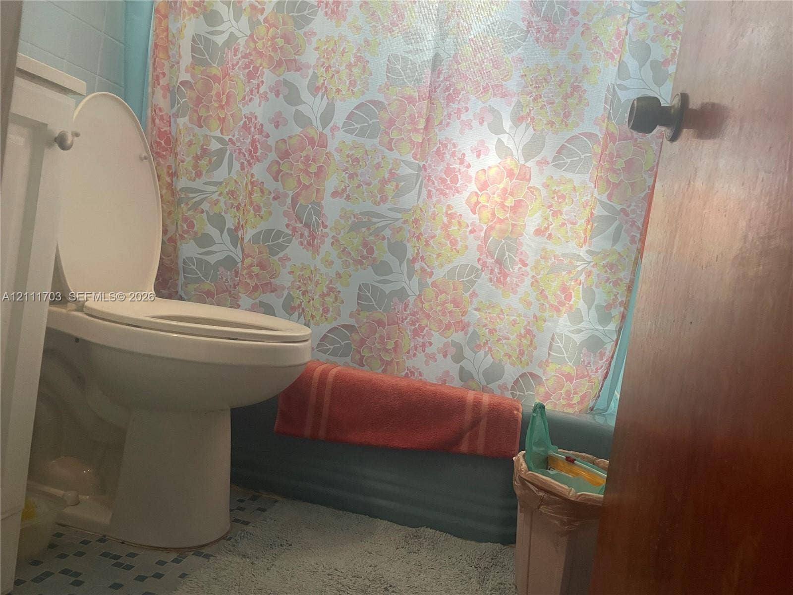 21840 SW 118th Avenue, Miami, FL 33170 Bathroom featuring a standard toilet, a tub with a solid-color surround, and tiled flooring