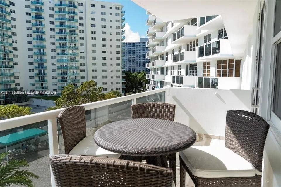 3725 S Ocean Drive, #508, Hollywood, Hollywood, FL 33019 Private balcony featuring a glass-panel railing and tile flooring
