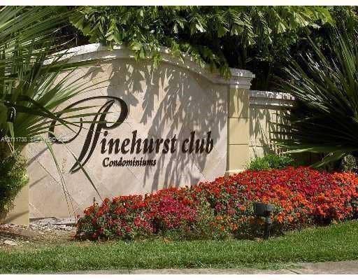 460 S Park Road, #308, Hollywood, Hollywood, FL 33021 Stone-clad monument signage featuring architectural detailing, accented by manicured landscaping and mature foliage