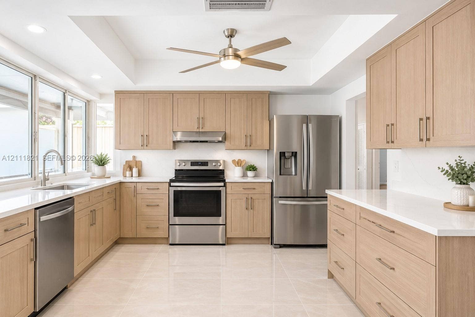 Kitchen featuring virtually staged