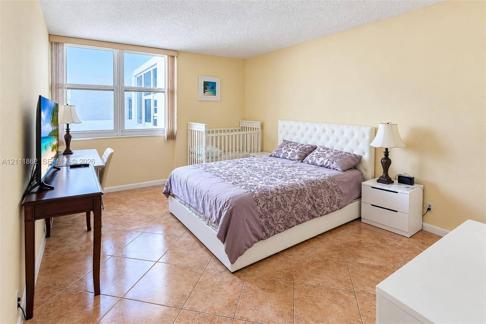 2030 S Ocean Drive, #2004, Hallandale Beach, FL 33009 Spacious room featuring large-format diagonal tile flooring and expansive windows with natural light
