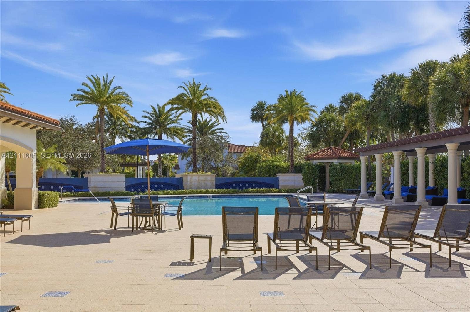 1034 SW 113th Avenue, Pembroke Pines, FL 33025 Pool area with deckchairs