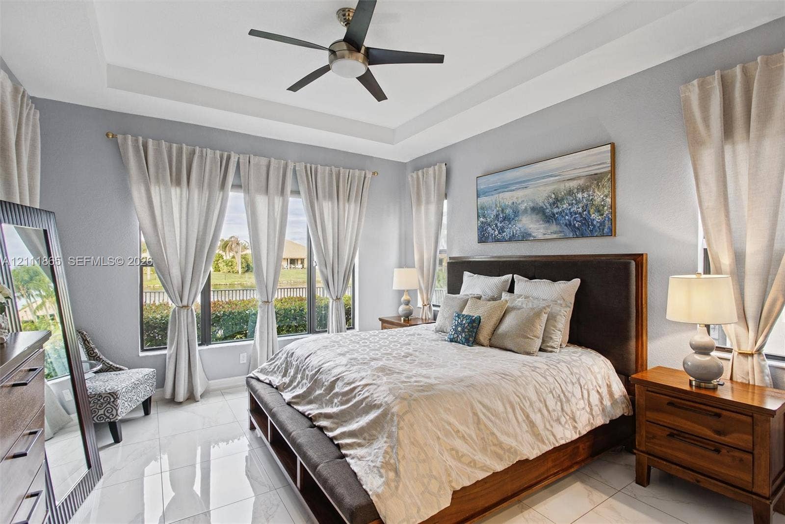 1034 SW 113th Avenue, Pembroke Pines, FL 33025 Large Master with tray ceiling, lighted ceiling fan & expansive windows.