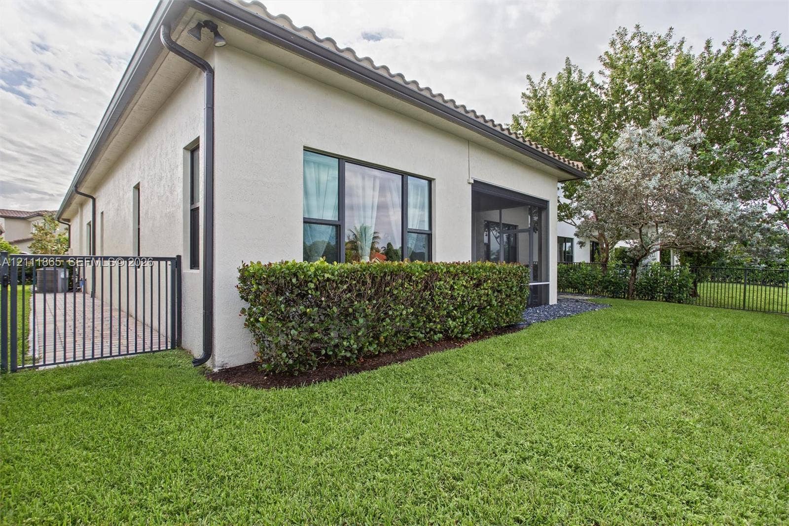 1034 SW 113th Avenue, Pembroke Pines, FL 33025 Nicely manicured rear view of home