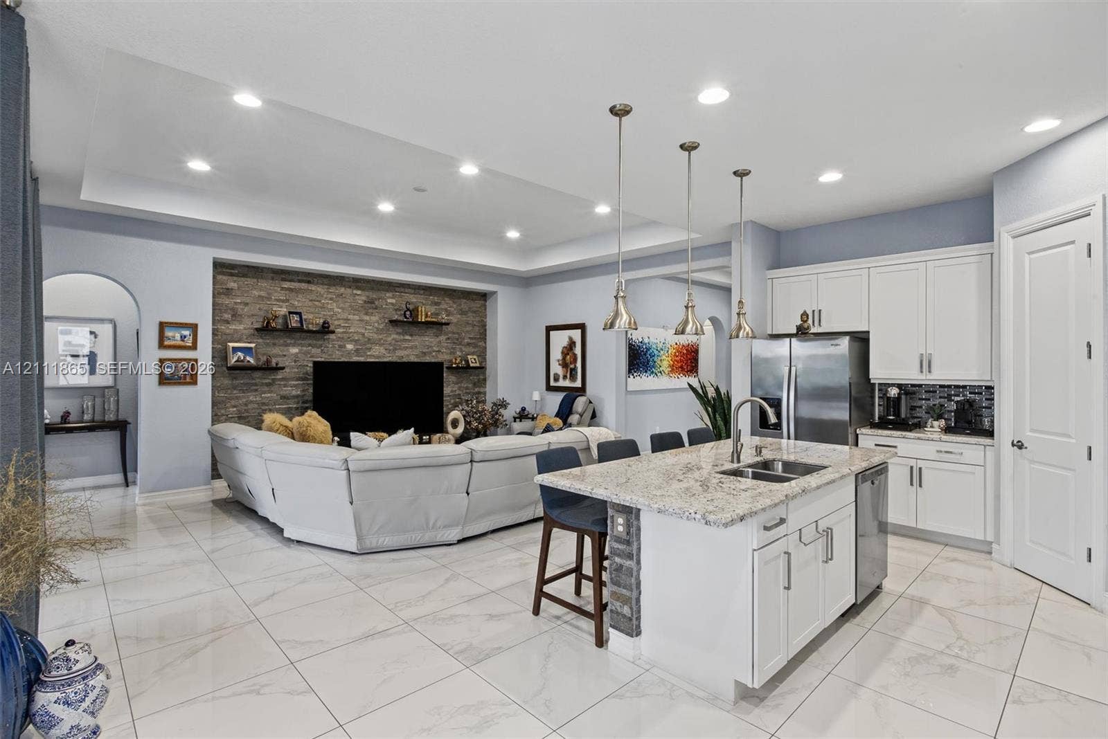 1034 SW 113th Avenue, Pembroke Pines, FL 33025 Broad open concept view - notice high vaulted ceilings, sunken lights and elegant 24 x 24 tiles.