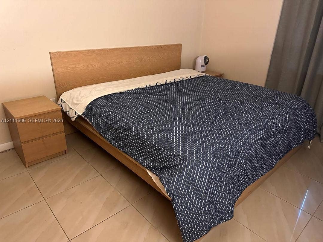 711 N Pine Island Road, #402, Plantation, Plantation, FL 33324 Room featuring neutral wall tones and large-format tile flooring