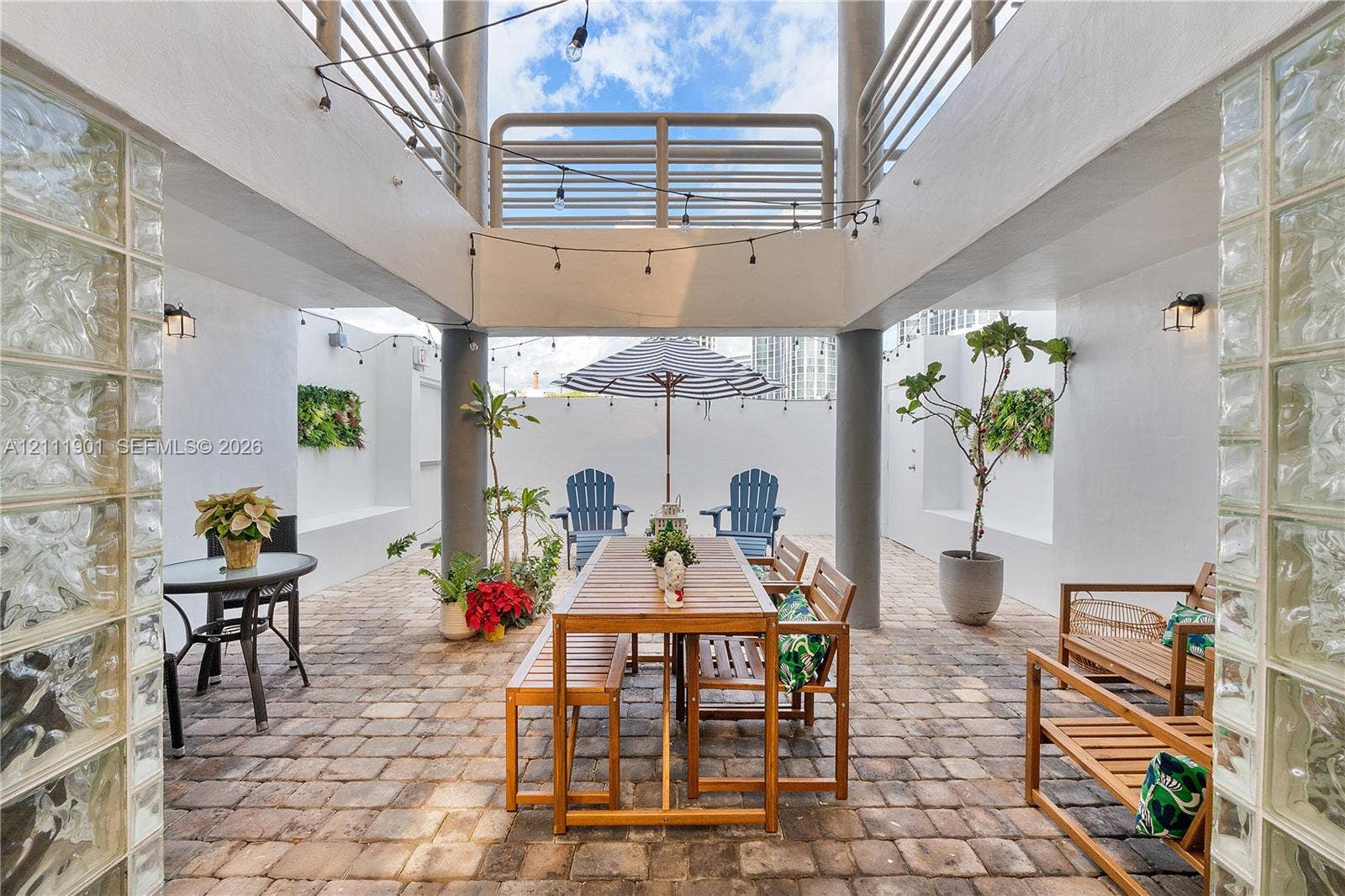 2977 Mcfarlane Road, #9, Miami, FL 33133 Open-air common area just outside you front door