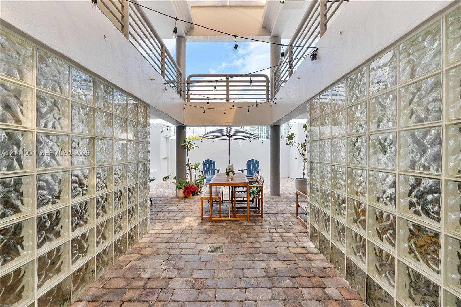 2977 Mcfarlane Road, #9, Miami, FL 33133 Open-air common area just outside you front door