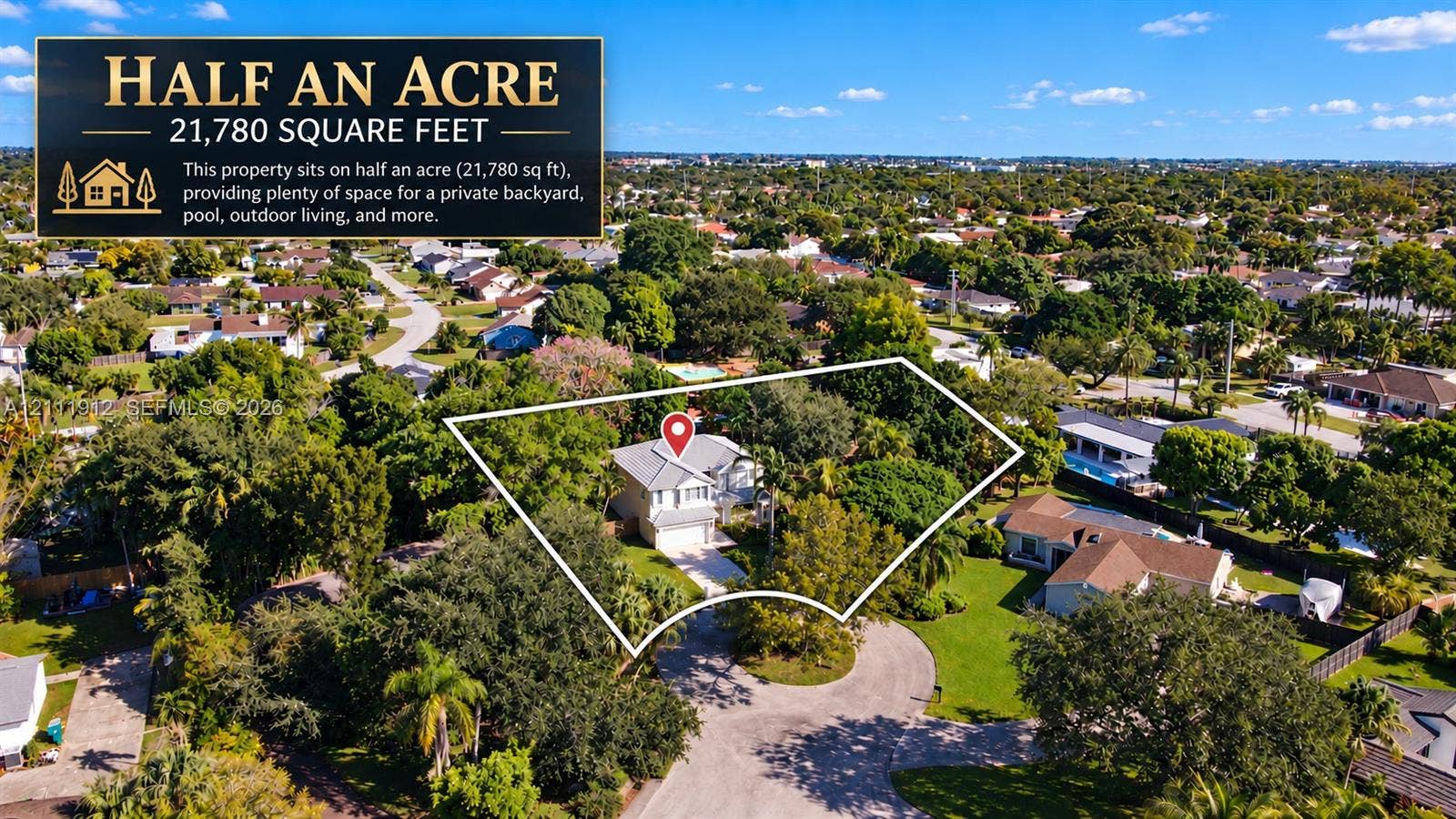 15681 SW 147th Court, Miami, FL 33187 Half-acre parcel featuring mature trees, a multi-story residence, and a paved driveway