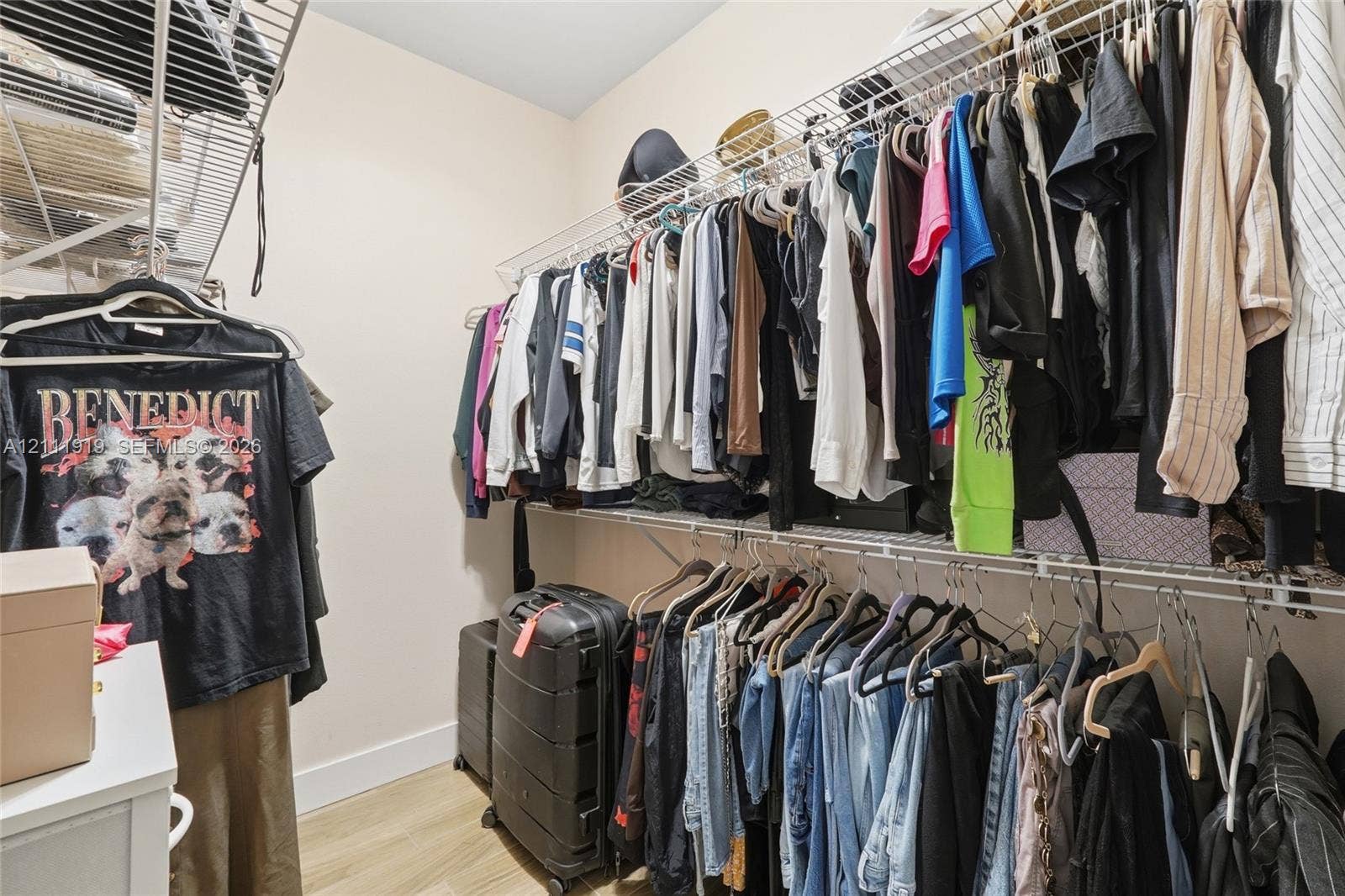 137 Arrowhead Lane, Haines City, FL 33844 Walk-in closet featuring tiered wire shelving and light-toned hard-surface flooring