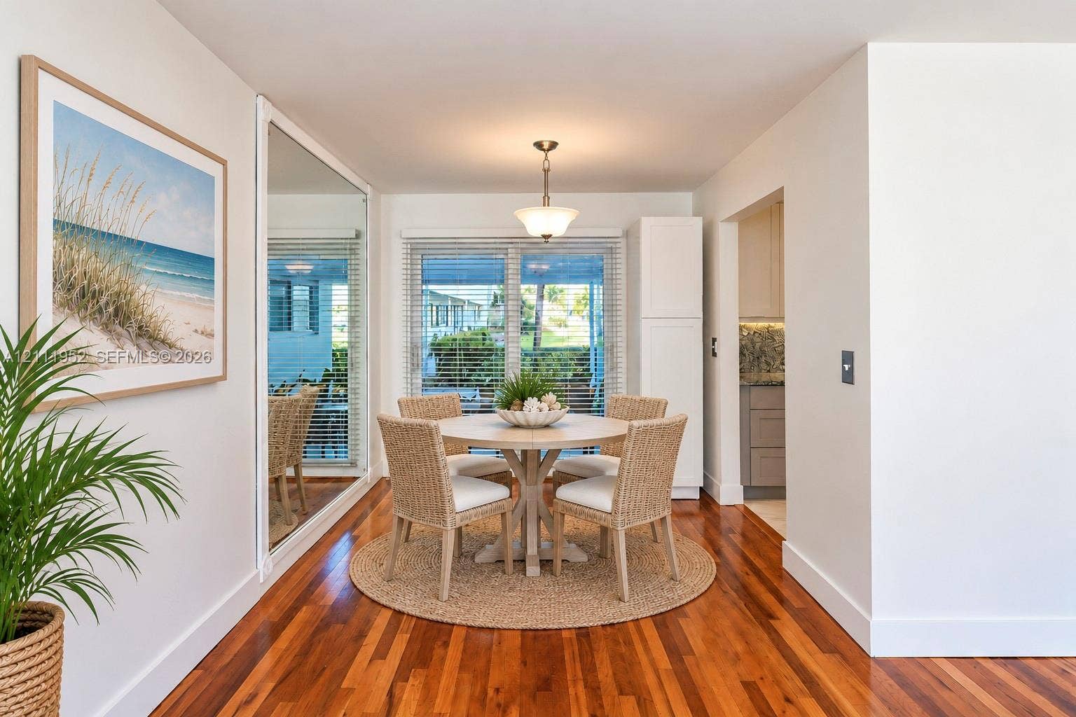 Dining Room leads out to patio through impact sliding doors.